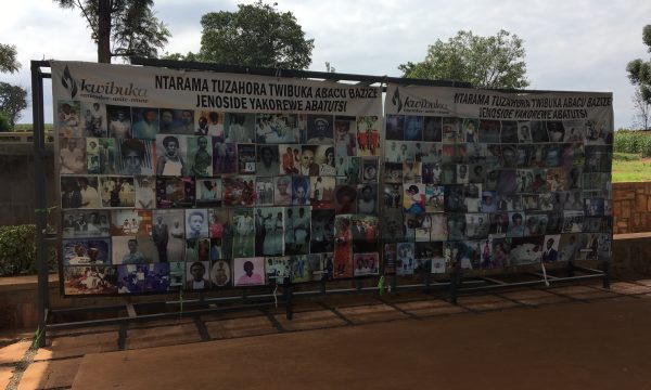 Photo shows a banner with photos of Rwandans lost in an attack on a church during the 1994 genocide at the Ntarama Memorial.