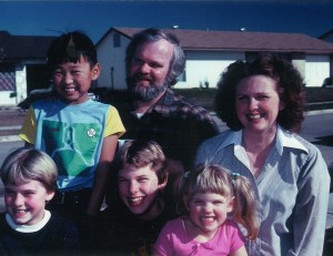 The author with his adoptive parents and three siblings.