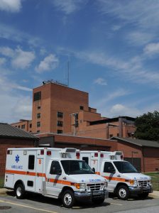 Two ambulances outside a hospital 