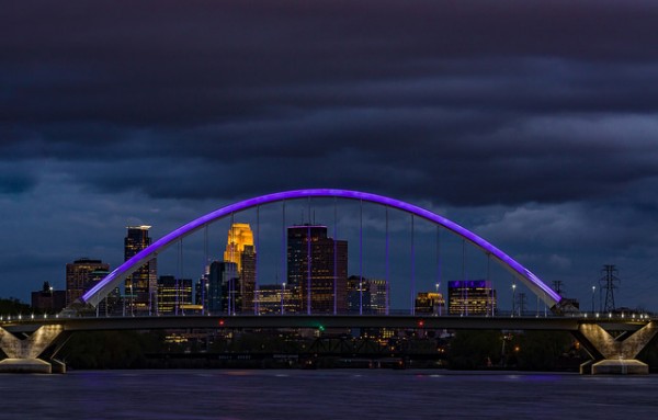 Among many Minneapolis landmarks lit purple, the Lowry Bridge frames downtown on the night of Prince's death. Tony Webster, Flickr CC.